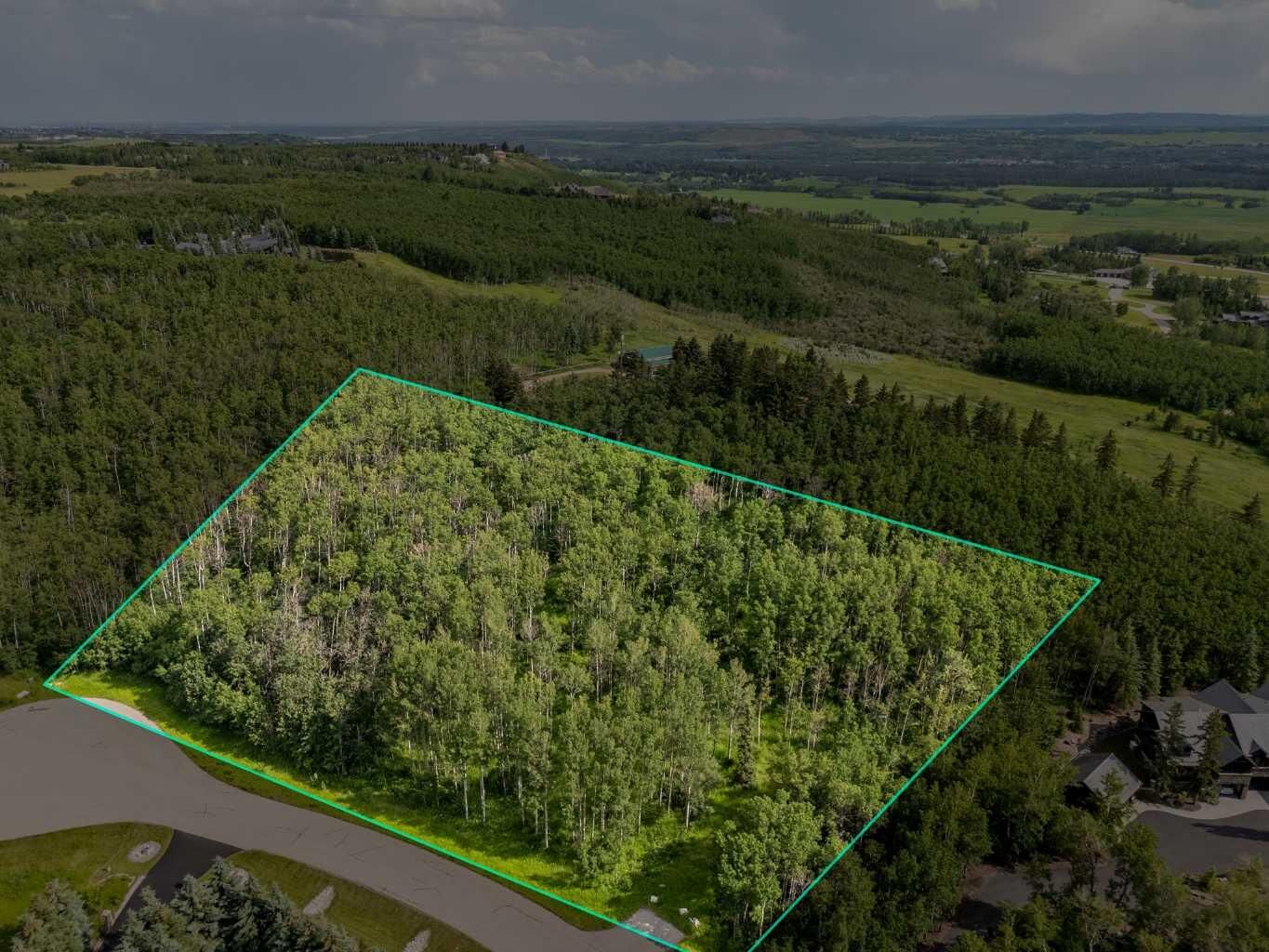 Property Photo: 25151 Escarpment Ridge View AB T3Z 3M7