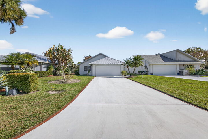 Property Photo:  7198 SE Quincy Terrace  FL 33455 