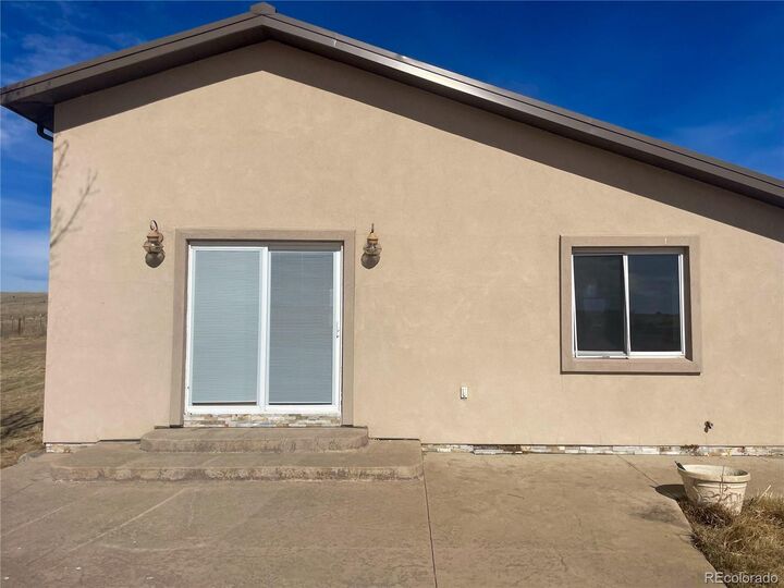 Property Photo: 45005 E Maplewood Drive CO 80102