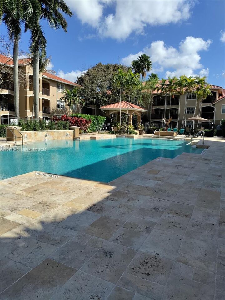 Property Photo:  215 SW 117th Ter 14205  FL 33025 