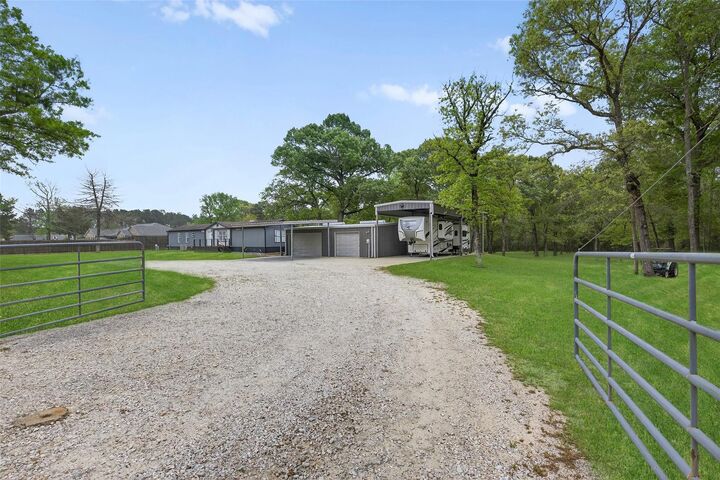 Property Photo:  1220 Fm 222 Loop N  TX 77331 