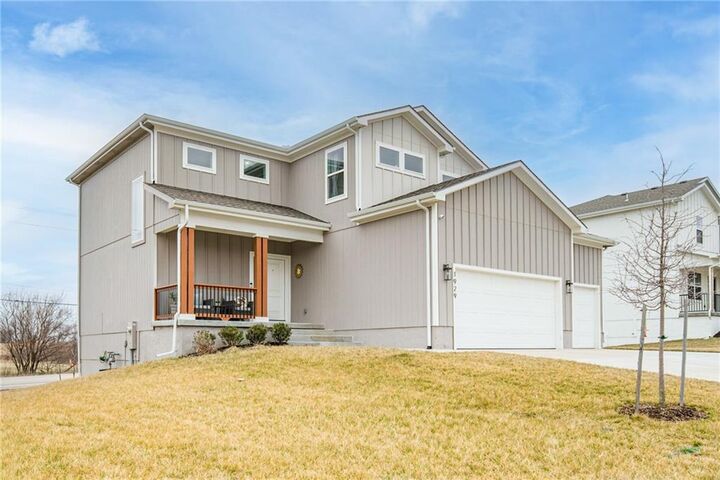 Property Photo:  1929 SW Merryman Drive  MO 64082 