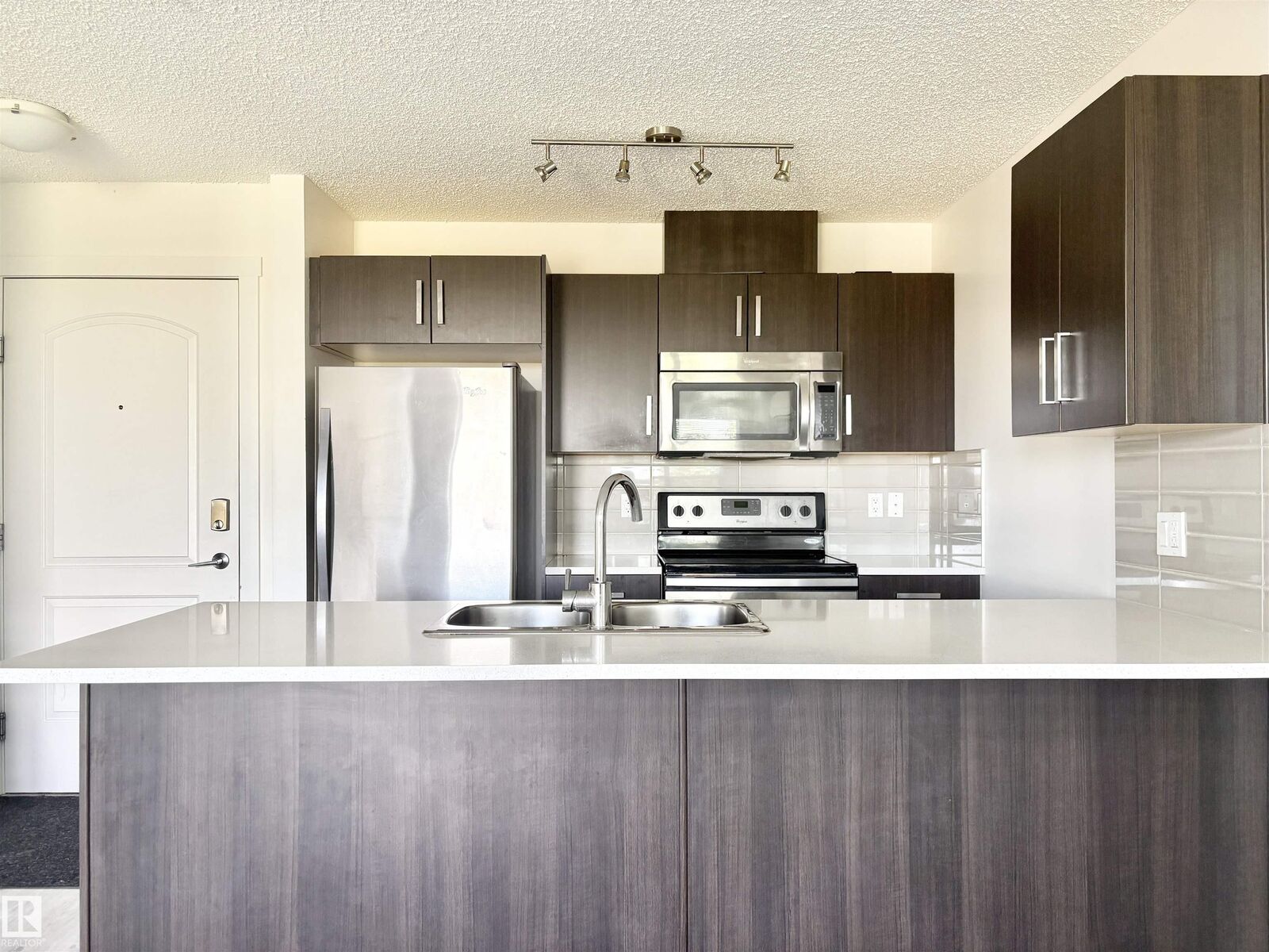 Property Photo:  667 Watt Boulevard SW 312  AB T6X 0Y2 
