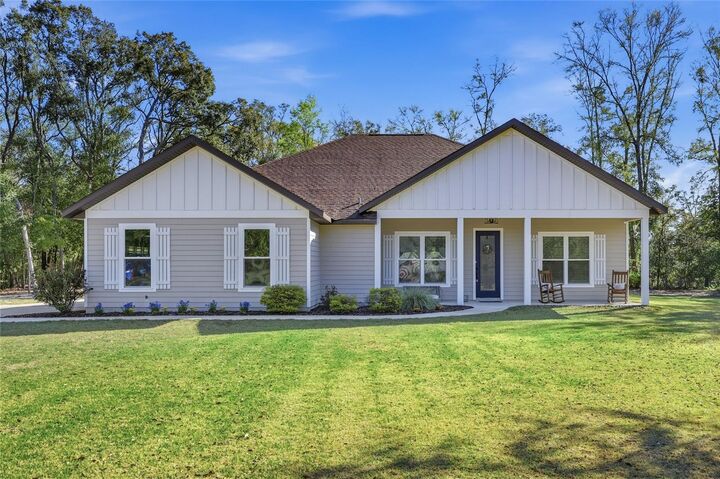 Property Photo:  8920 NE 8th Place  FL 32643 