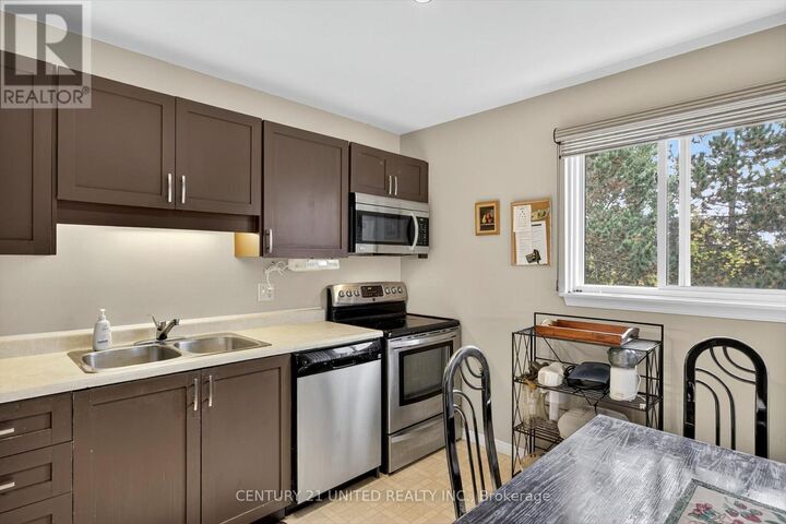 Property Photo:  2020 Mapleridge Drive 303  ON K9K 1W2 