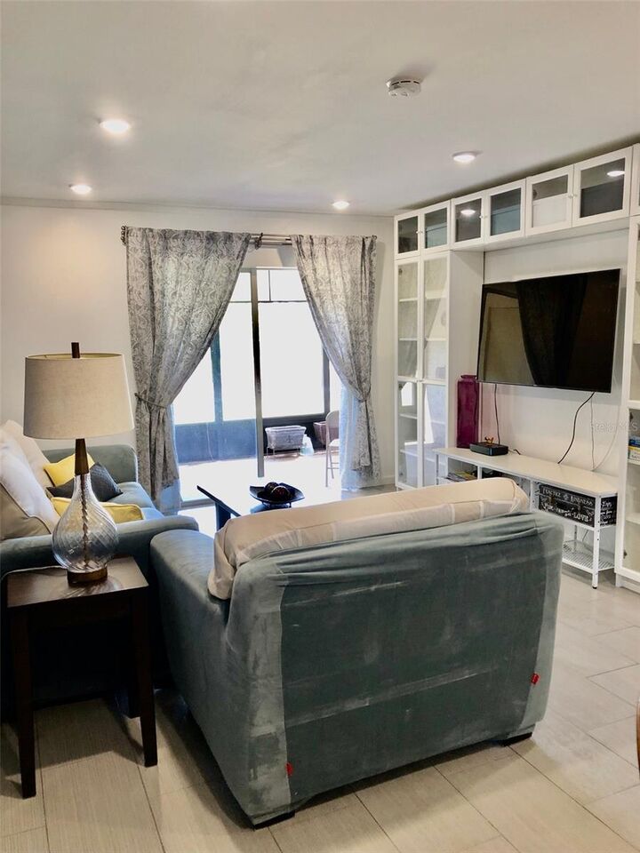 Property Photo:  102 Capri Isles Boulevard 106  FL 34292 