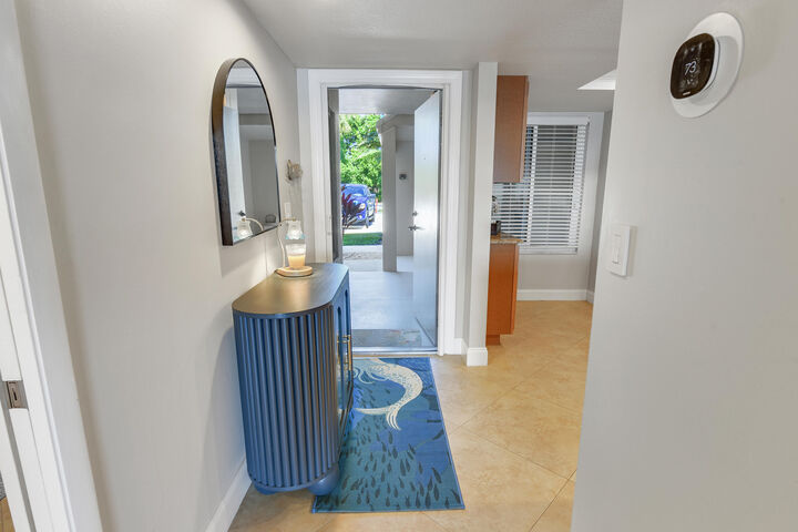 Property Photo:  4440 NE Sandpebble Trace 104  FL 34996 