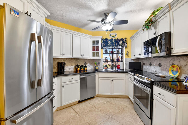 Property Photo: 5188 Europa Drive G FL 33437