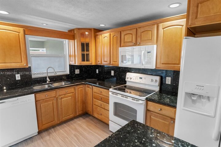 Property Photo:  1340 NE 28th Ave 244  FL 33062 