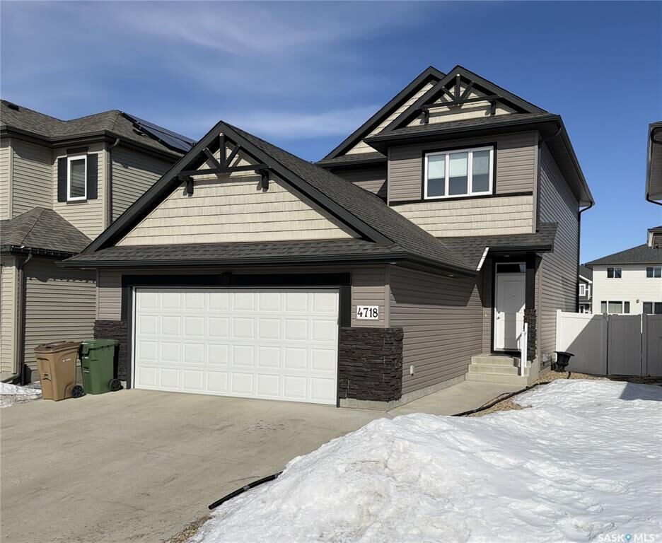 Property Photo:  4718 Green Brooks Way E  SK S4V 3K6 