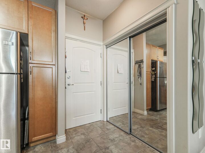 Property Photo: 12408 15 Avenue SW 412 AB T6W 1X2