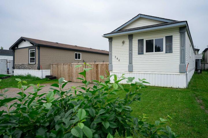 Property Photo: 284 Caouette Crescent AB T9K 2H9