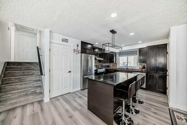 Property Photo: 584 Whiteridge Way NE AB T1Y 2Y5
