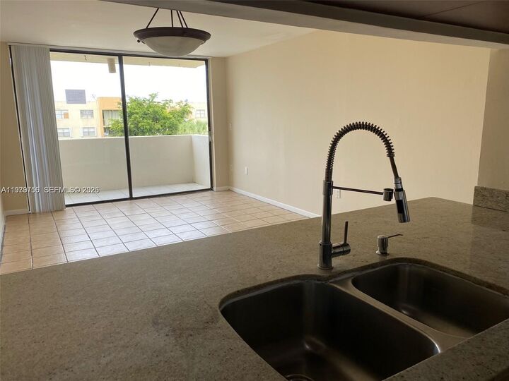 Property Photo:  8002 SW 149th Ave B409  FL 33193 