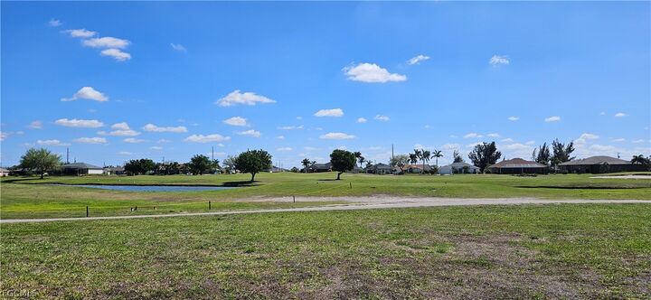 Property Photo:  1511 NW 26th Place  FL 33993 