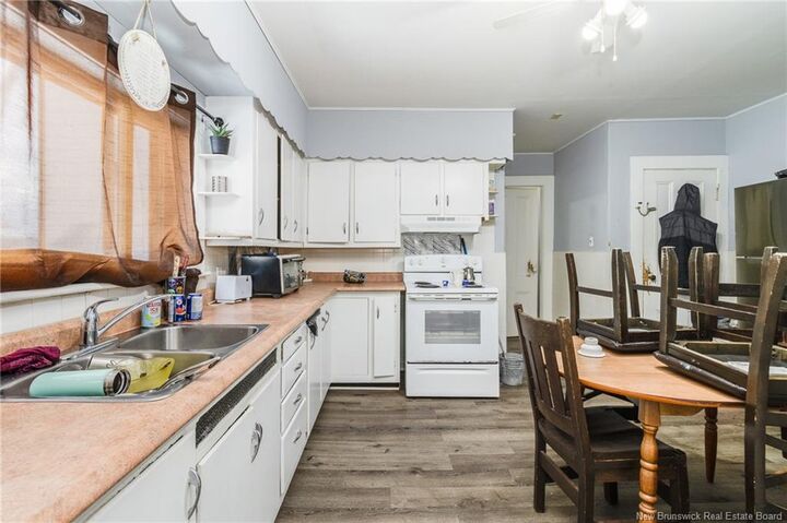 Property Photo: 204 Duke Street NB E1N 1J1