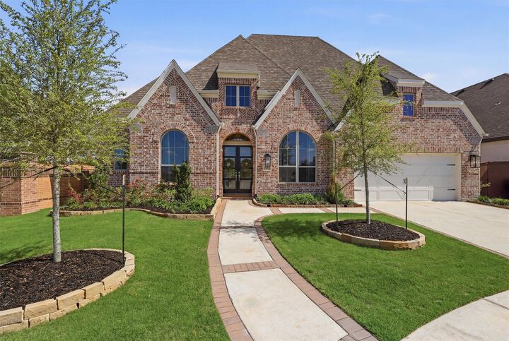 Property Photo: 7518 Winecup Blossom Court TX 77493