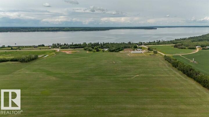 Property Photo:  Hwy 20 Range Rd 391  AB T4S 1T2 