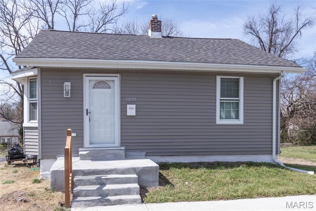 Property Photo: 6019 Jackson Avenue MO 63134