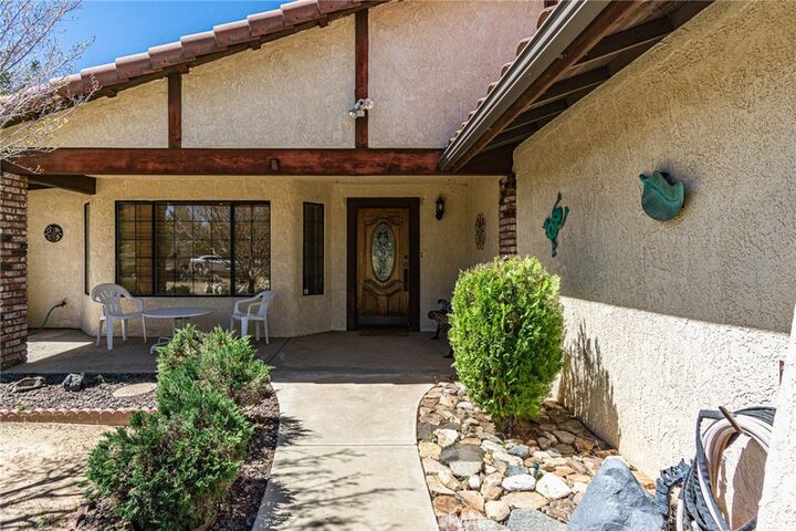 Property Photo:  7040 Kenyon Avenue  CA 92345 