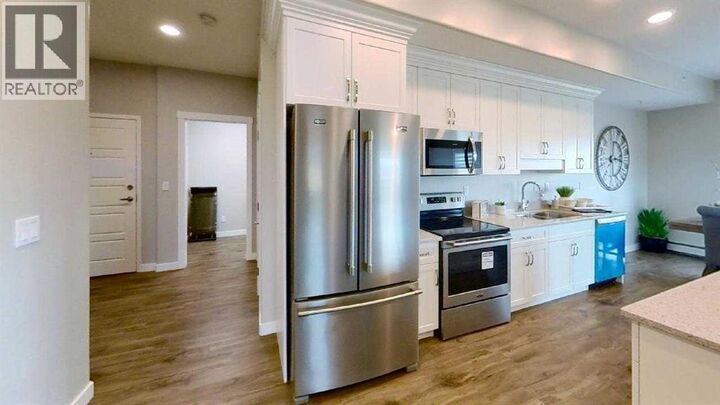 Property Photo: 499 Meadow Lake Court East AB T1R 0Y7