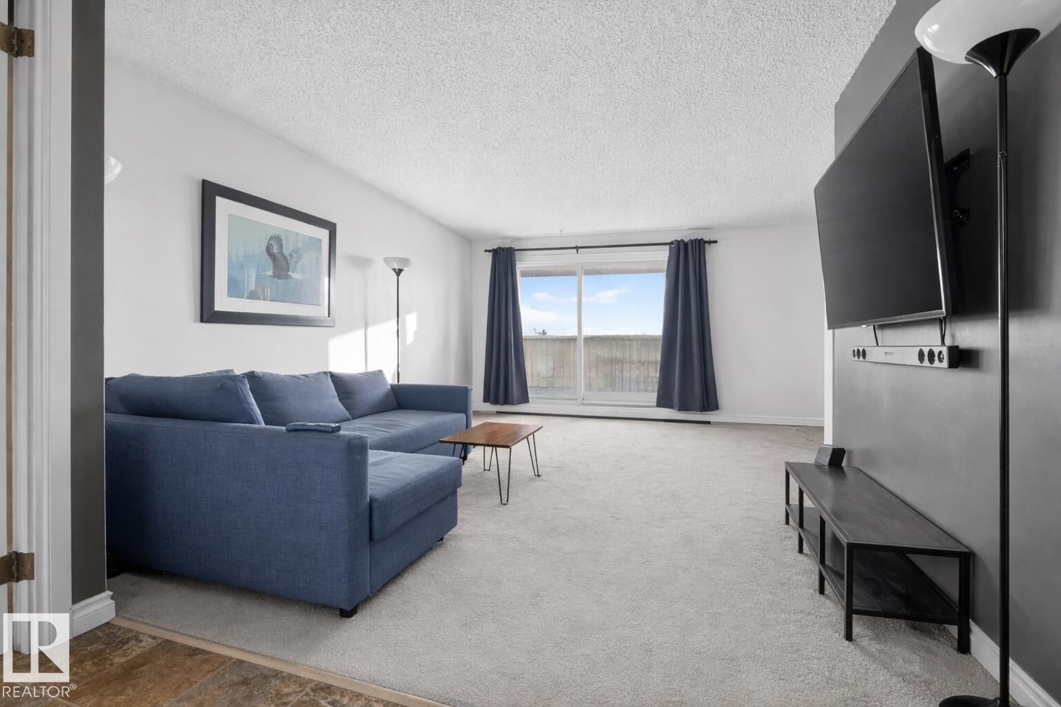 Property Photo: 5125 Riverbend Road NW 407 AB T6H 5K5