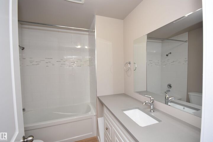 Property Photo: 13527 70 Street NW AB T5C 0K5