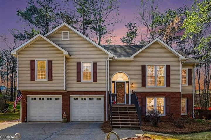 Property Photo:  1052 SW Queensbury Run  GA 30102 