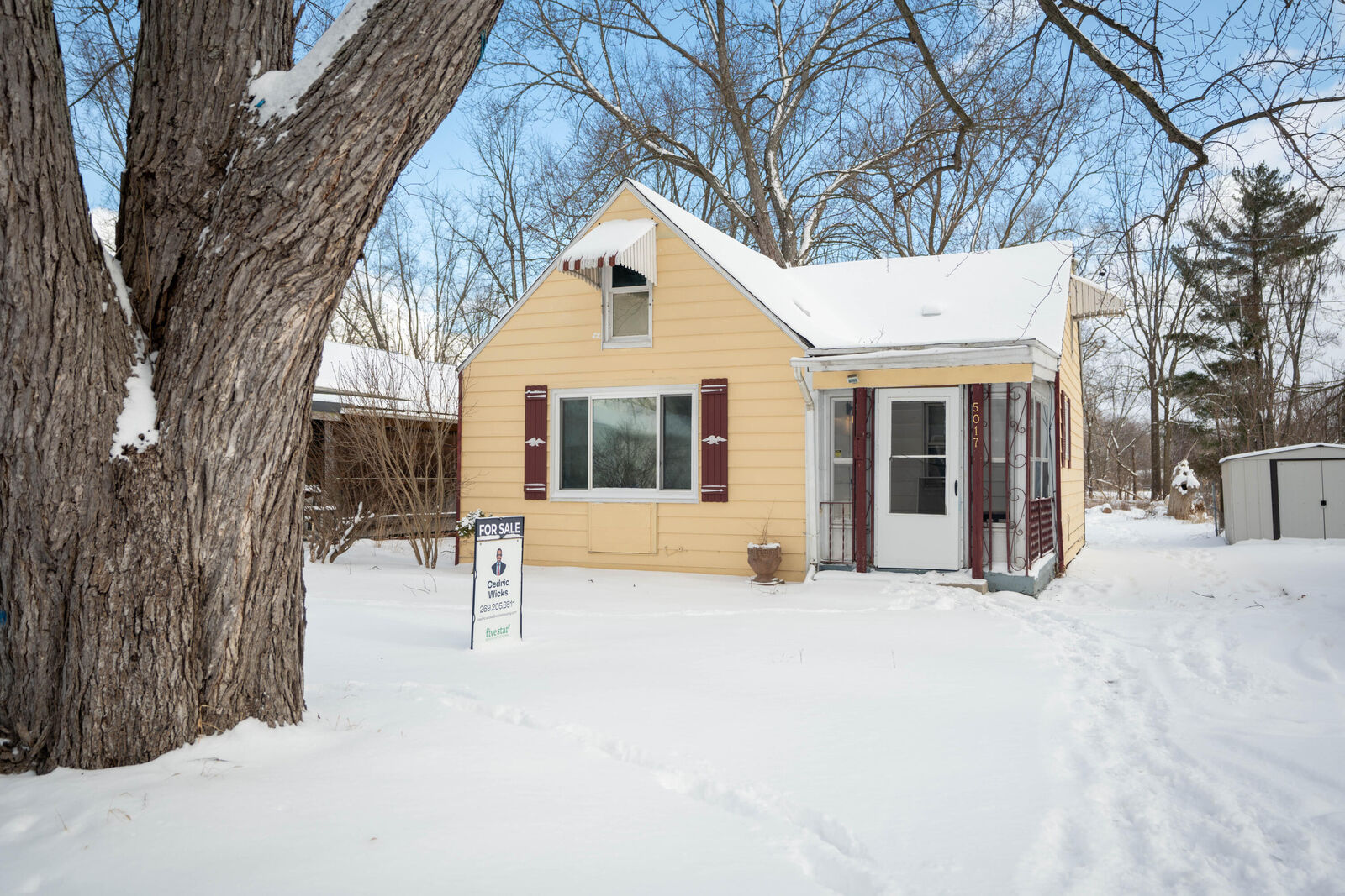 Property Photo:  5017 Christiansen Road  MI 48910 