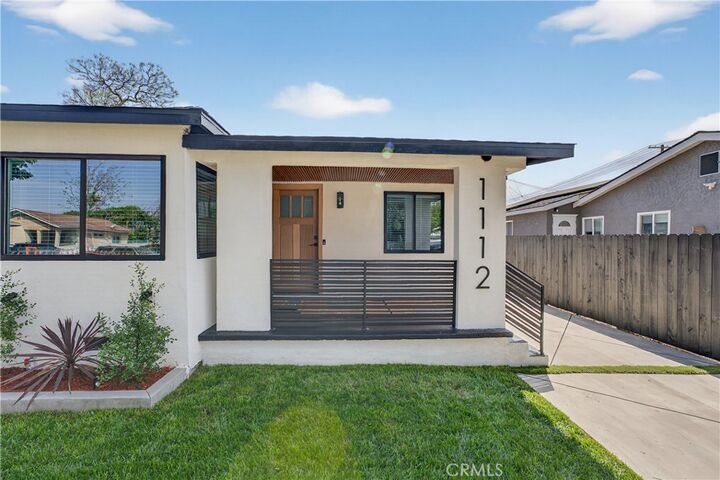 Property Photo:  1112 E 102nd Street  CA 90002 