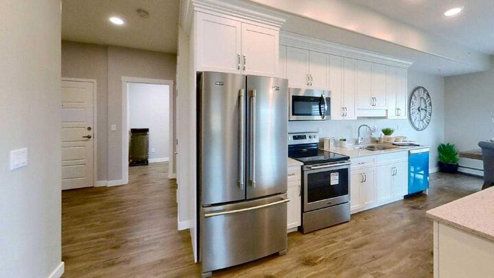 Property Photo: 499B Meadow Lake Court E 201 AB T1R 0Y7