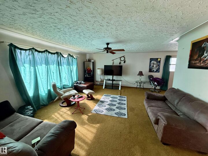 Property Photo:  5110 50 Street  AB T0A 3A1 