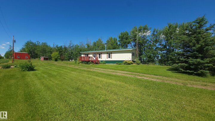 Property Photo: 55418 Range Road 70 AB T0W 2A0
