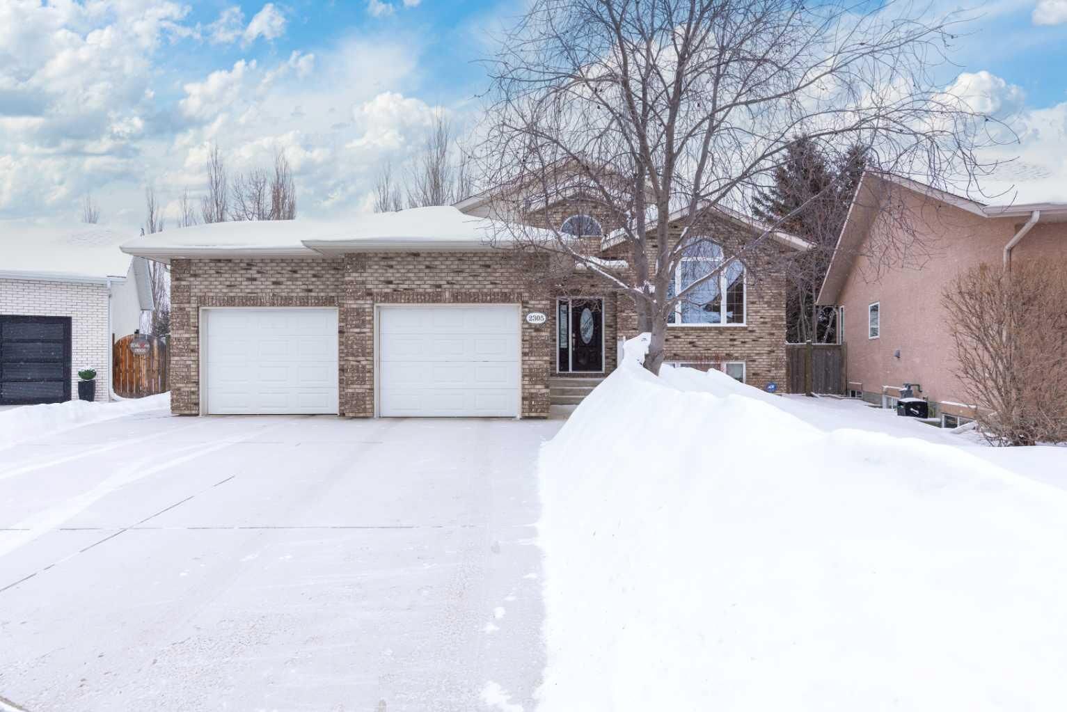 Property Photo:  2305 59B Avenue Close  AB T9V 3J3 