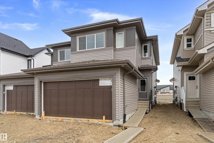 Property Photo: 1048 Cristall Crescent SW AB T6W 5S6
