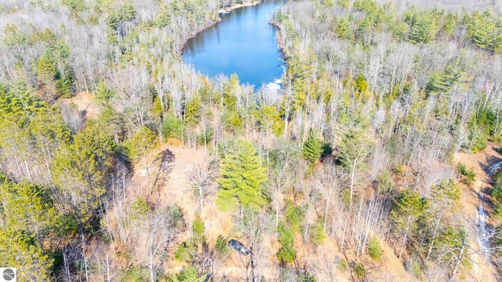 Property Photo:  1.24 Acres Snowbowl Road  MI 48629 