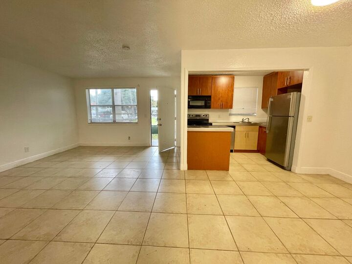 Property Photo:  400 NW 65th Avenue 114  FL 33063 