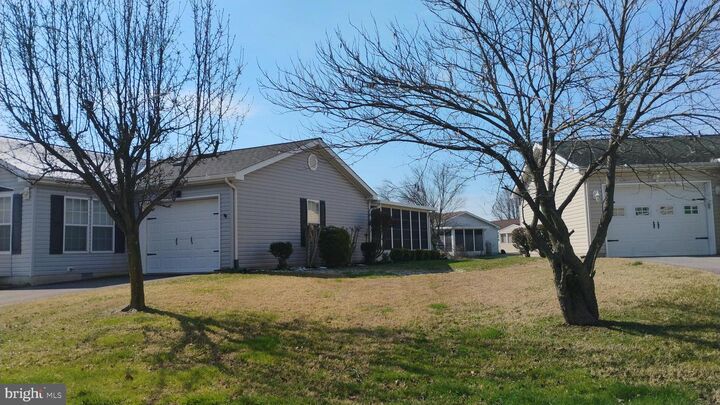 Property Photo:  311 W Persimmon Circle W 311  DE 19901 