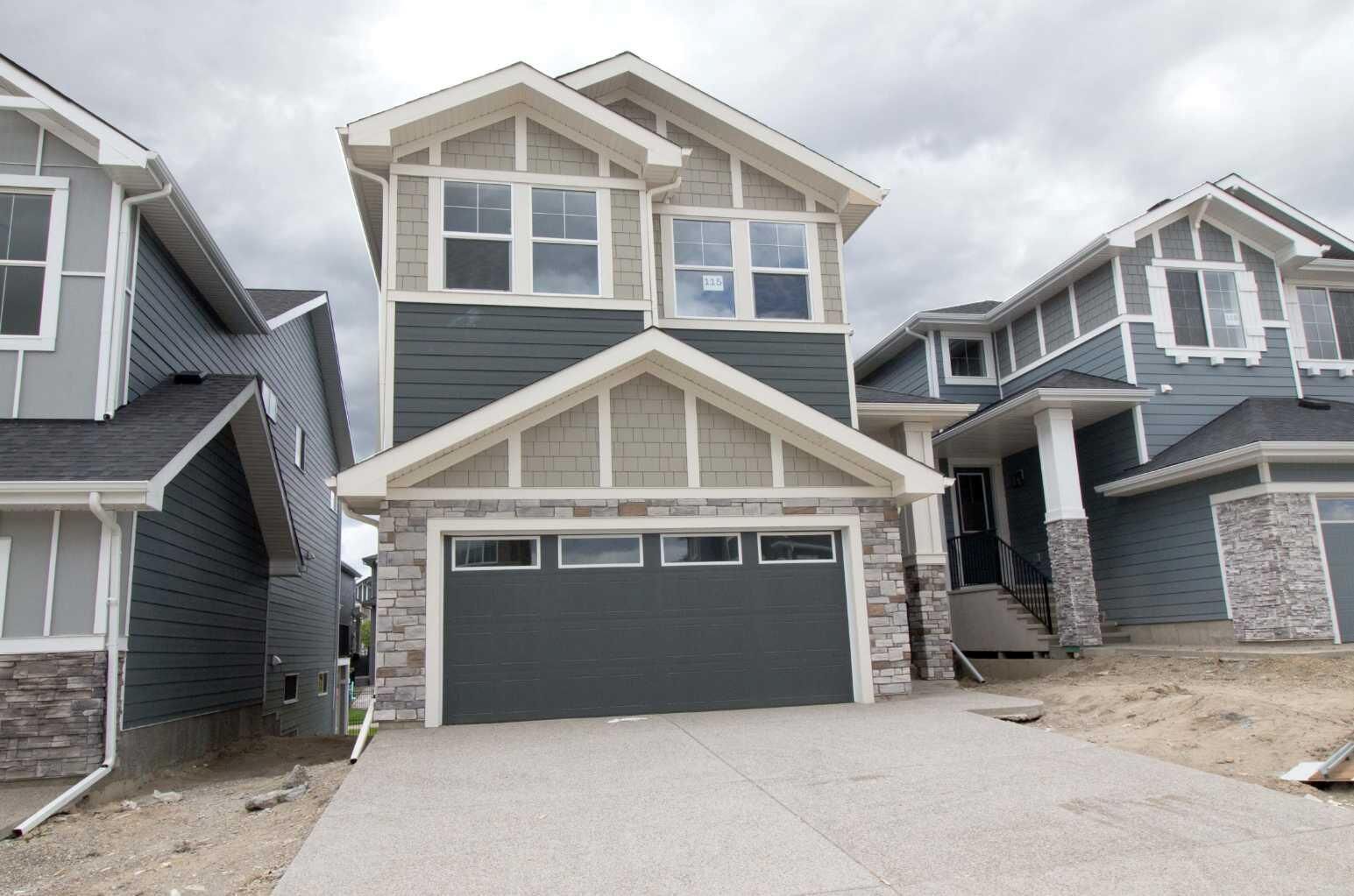 Property Photo: 115 Sundown Crescent AB T4C 1Y3