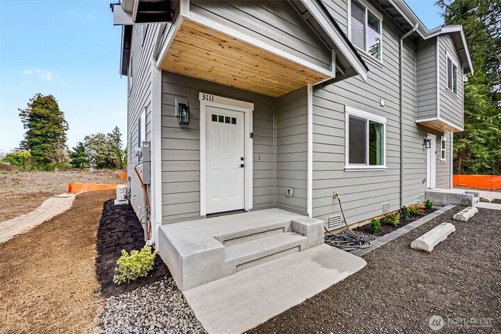 Property Photo: 3111 3113 E Camellia Way WA 98366