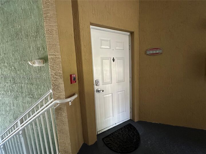 Property Photo:  11202 NW 83rd St 214  FL 33178 