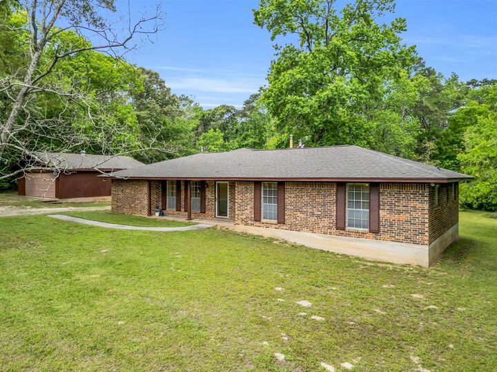 Property Photo:  10905 Rose Royal Drive  TX 77303 