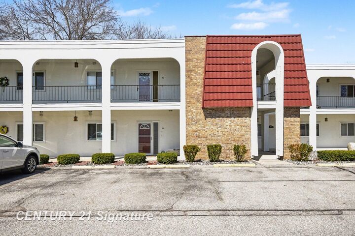 Property Photo:  9030 Greenway Boulevard D-50  MI 48609 