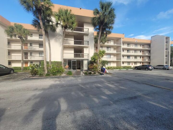 Property Photo:  5917 Via Vermilya 206  FL 33462 