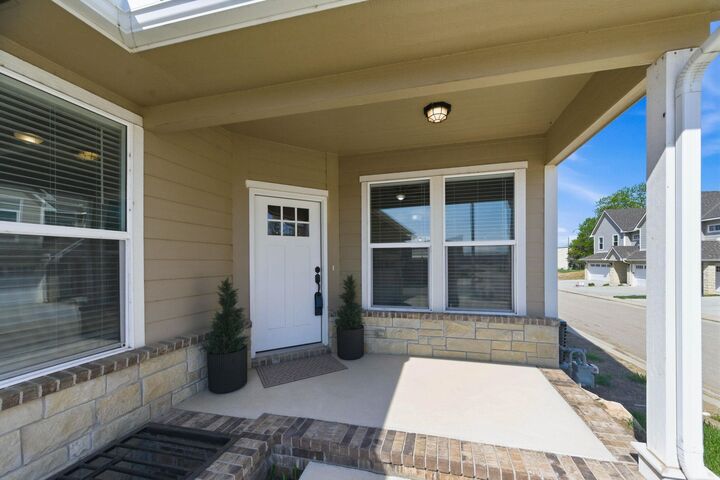 Property Photo:  331 N 127th St E Unit 402  KS 67206 