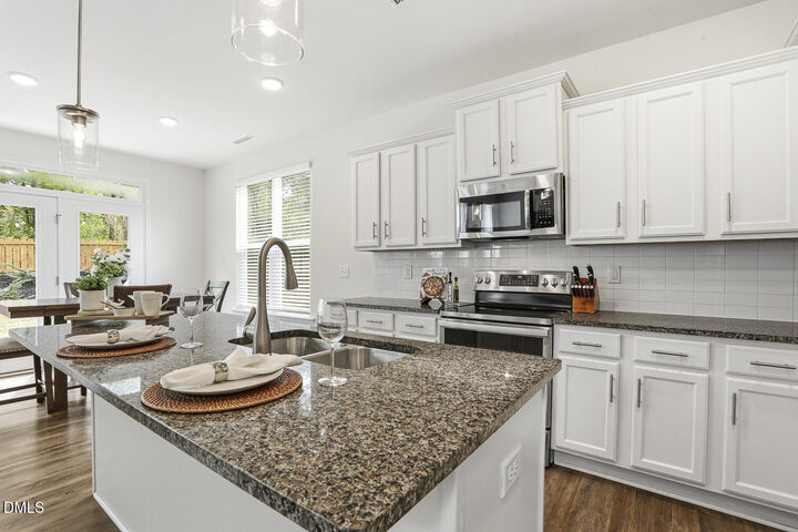 Property Photo:  820 Logan Meadow Court  NC 27526 