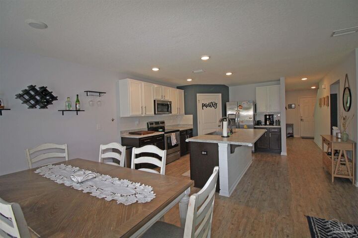 Property Photo:  9439 Lutoo Ln  FL 32526 