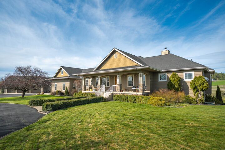 Property Photo:  10311 E Peone Landing Ln  WA 99021-5029 