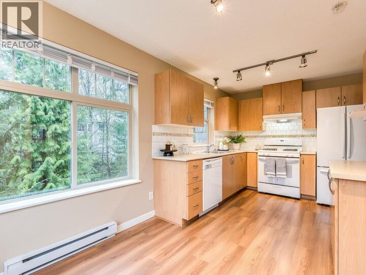 Property Photo: 2988 Silver Springs Boulevard 304 BC V3E 3R6