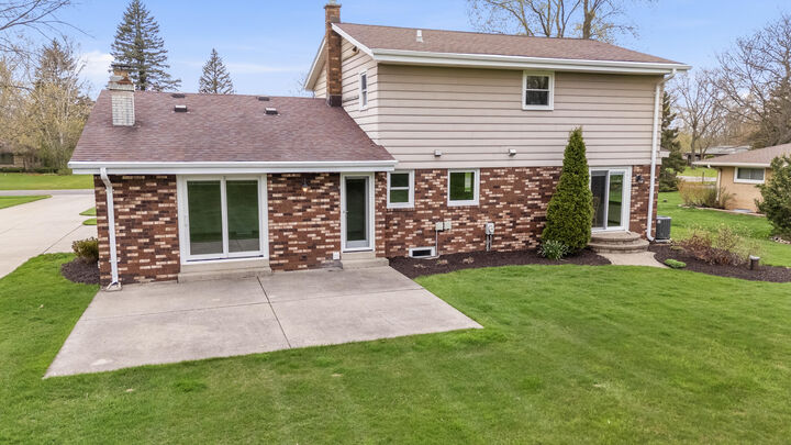 Property Photo:  W153n9830 Neptune Dr  WI 53022 